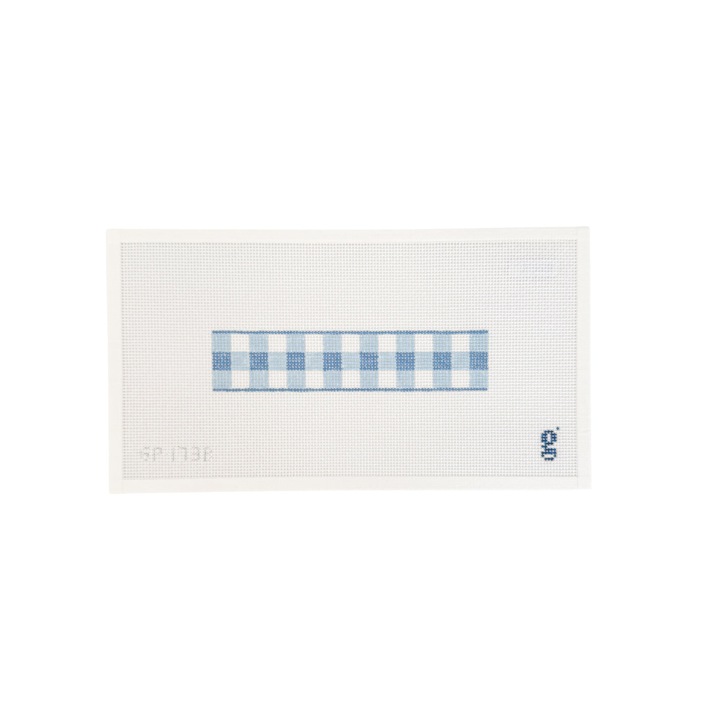 white rectangular needlepoint canvas with blue gingham key fob design at center