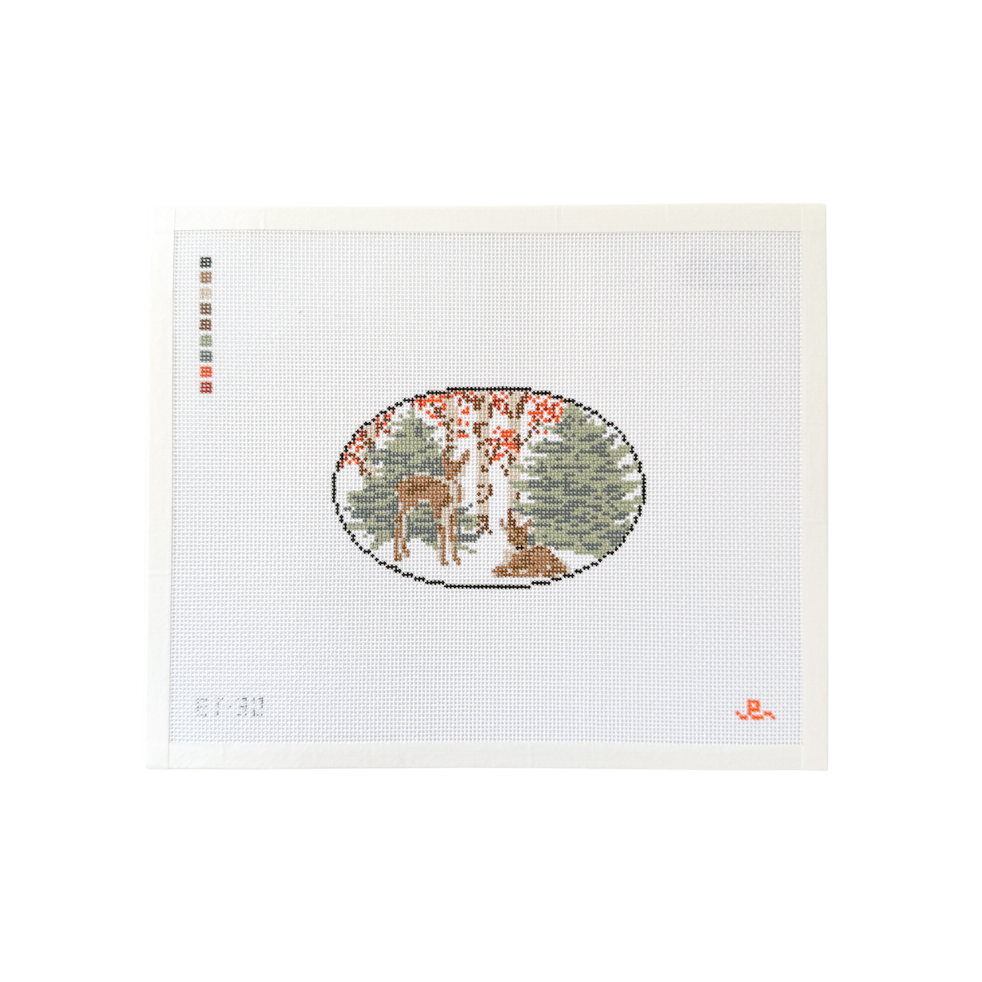 white rectangular needlepoint canvas with black oval design at center with 2 baby deer in front of pine and birch trees