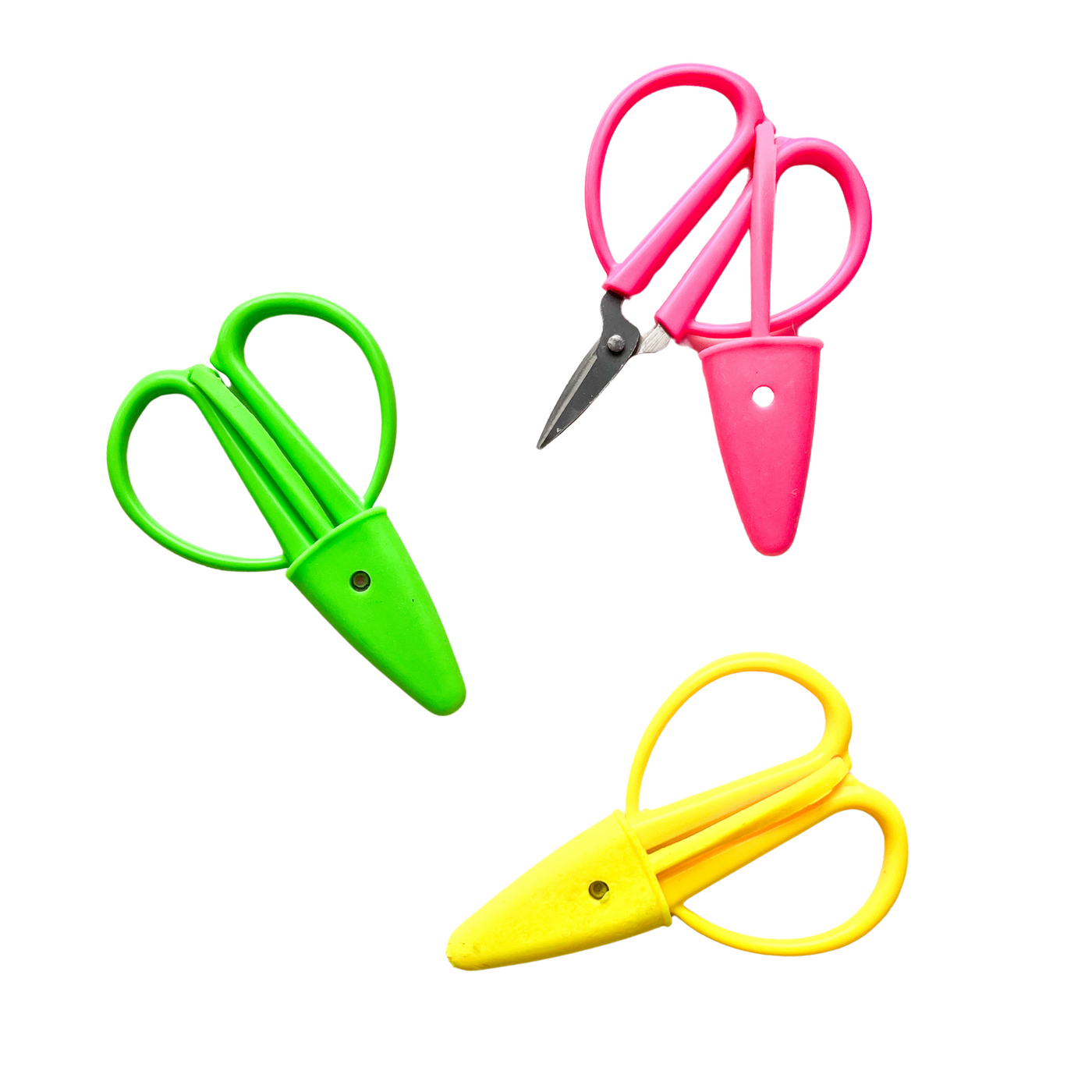 3 pairs of mini scissors. One in neon pink, one neon green, and one yellow.