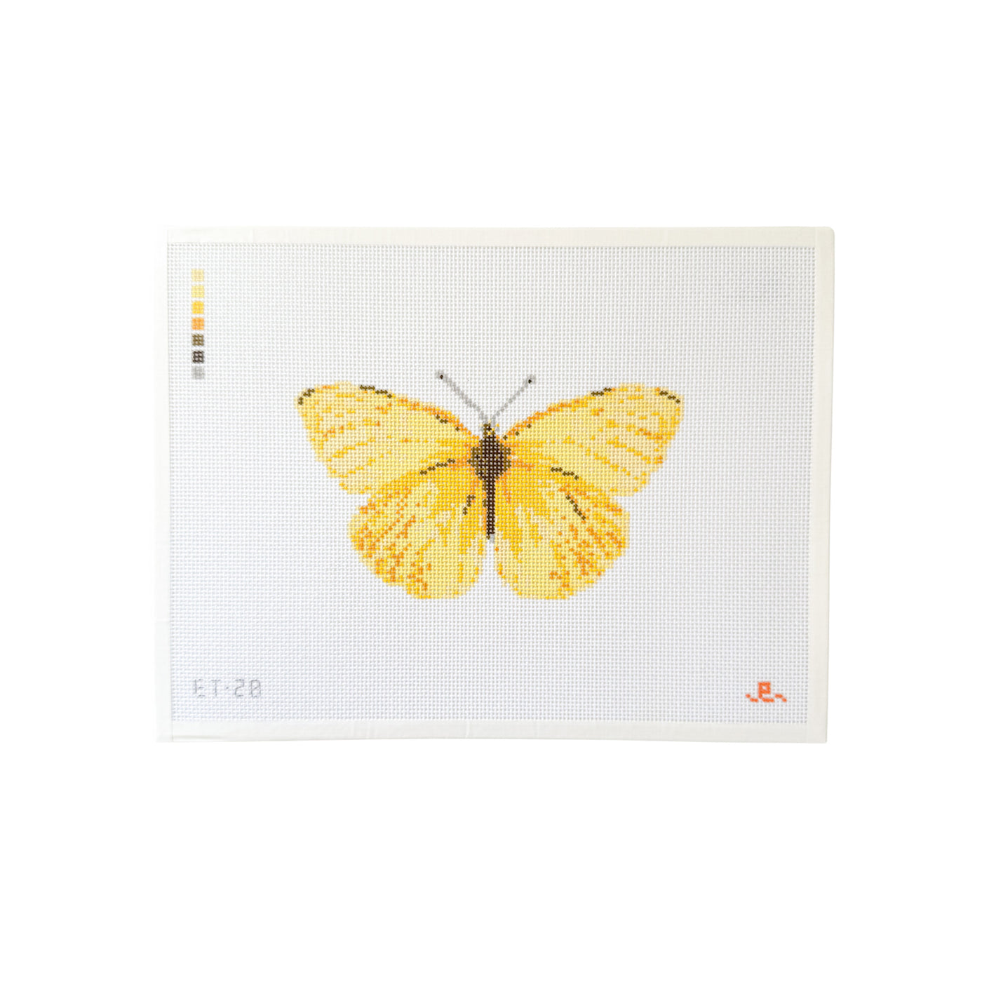 white rectangular needlepoint canvas featuring yellow butterfly at center