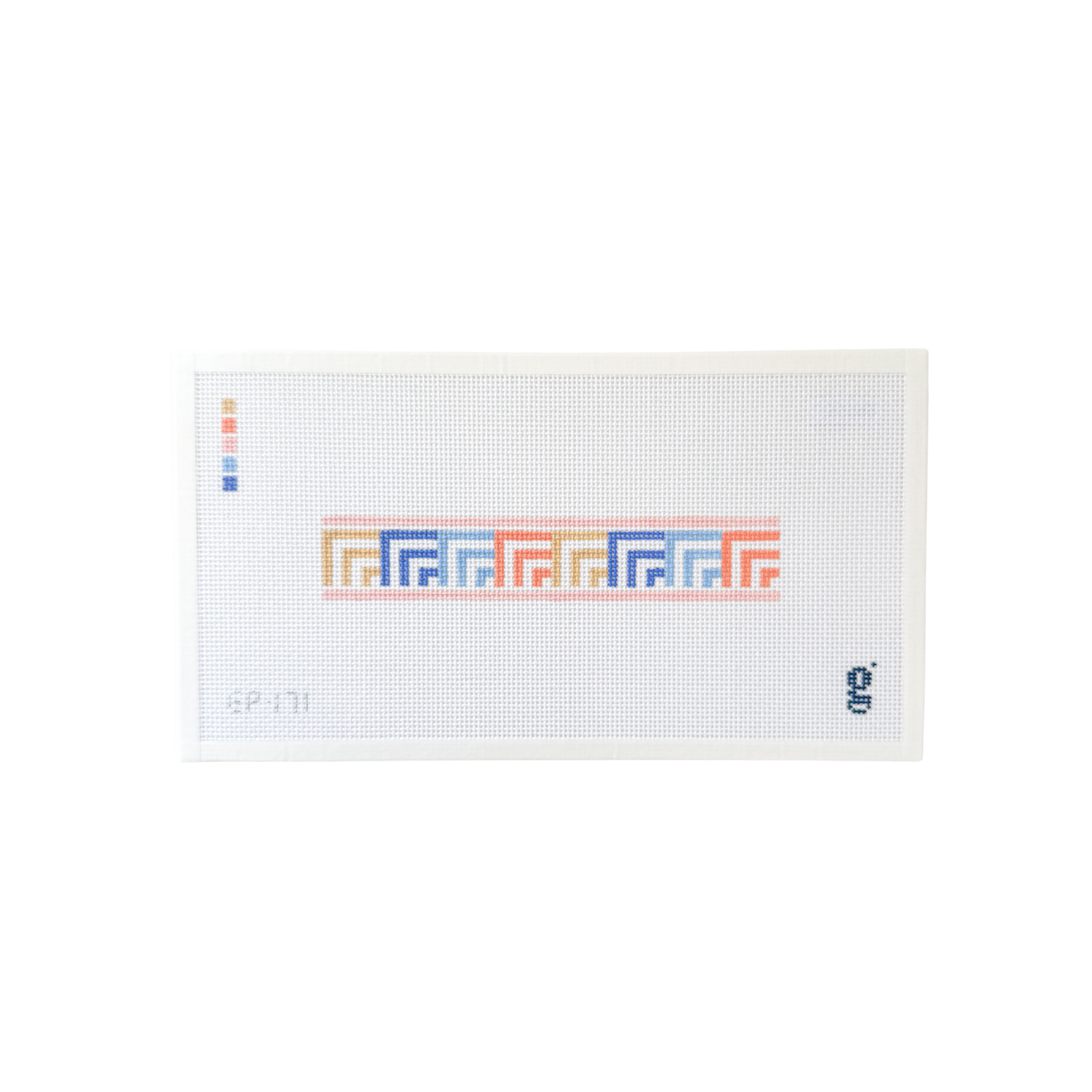 white rectangle needlepoint canvas with key fob design at center featuring periwinkle, coral and sand colored geometric pattern