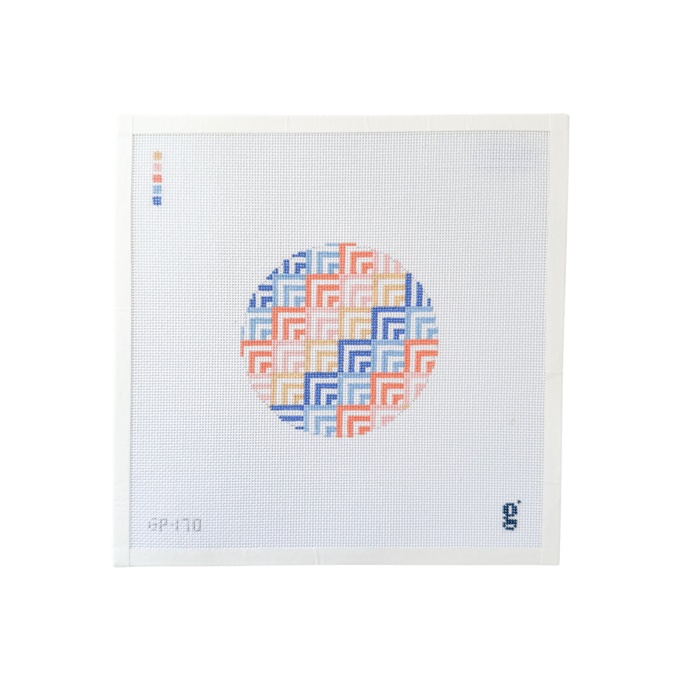 white square shaped needlepoint canvas with round design at center featuring periwinkle, coral and sand colored geometric pattern