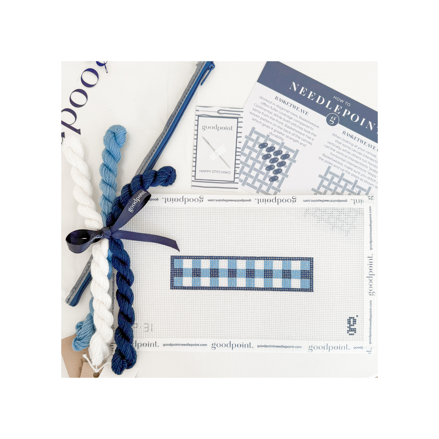 White and blue gingham key fob needlepoint canvas with threads, clear project bag, and instruction postcard