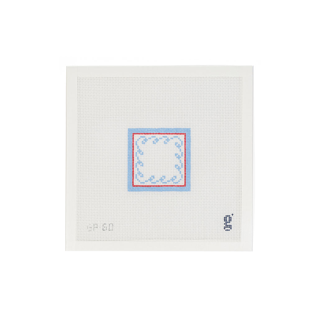 White square shaped needlepoint canvas with a light blue square design at center with a red stripe and a squiggle wave border in light blue.