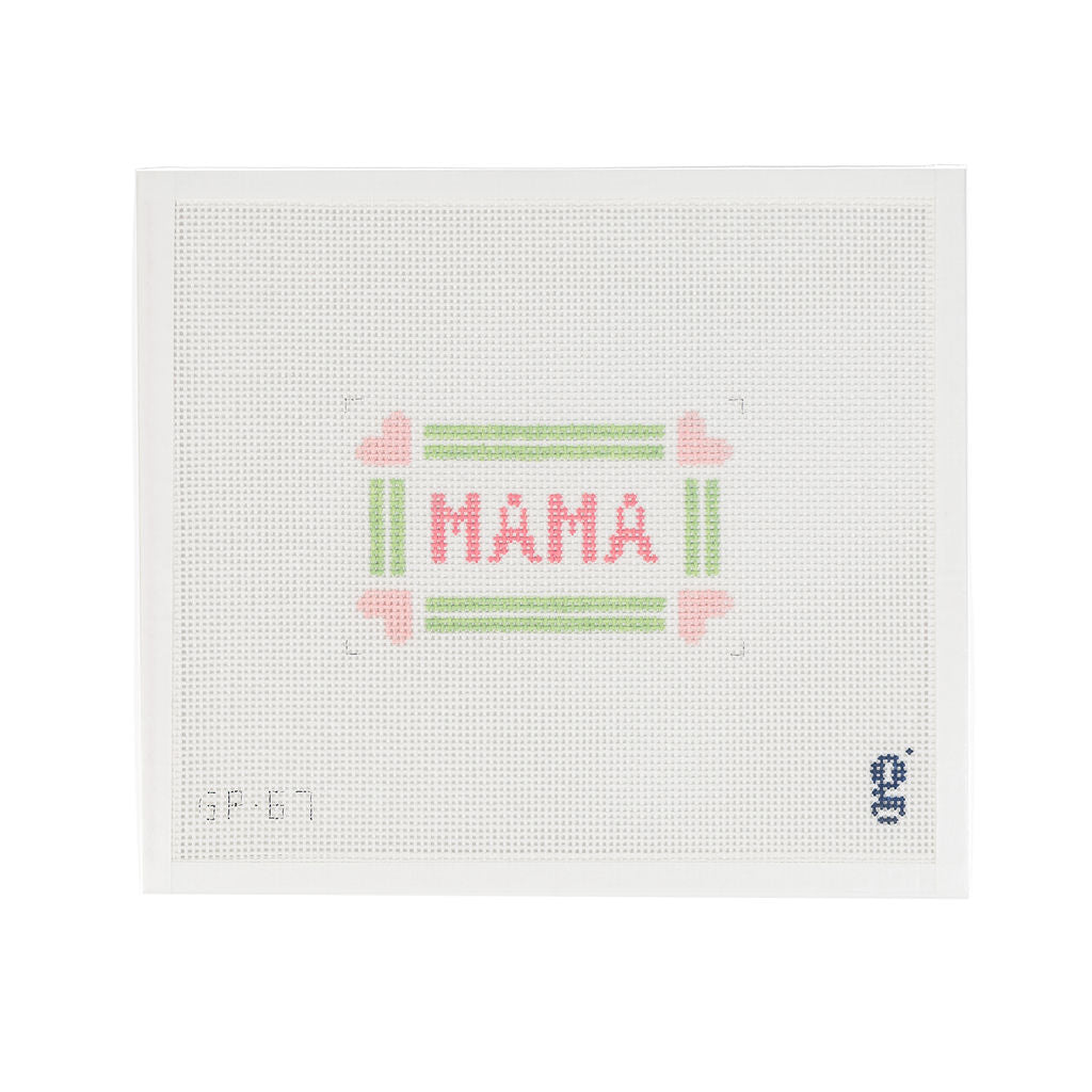White needlepoint canvas with the word "MAMA" in pink block text at center surrounded by a double green stripe border with pale pink hearts at each corner