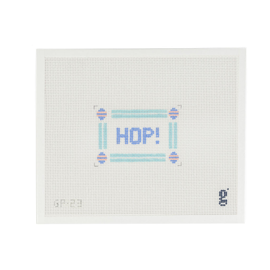 White needlepoint canvas with the word "HOP" in periwinkle text surrounded by aqua striped border with Easter eggs in each corner