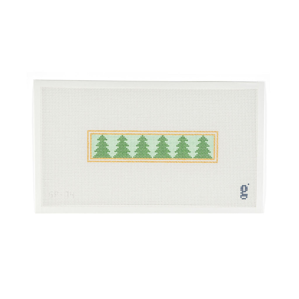 White needlepoint canvas featuring narrow gold rectangle with alternating mint green and green evergreen trees inside