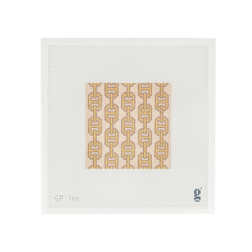 White needlepoint canvas with tan square design at center featuring gold vertical links outlined in brown.
