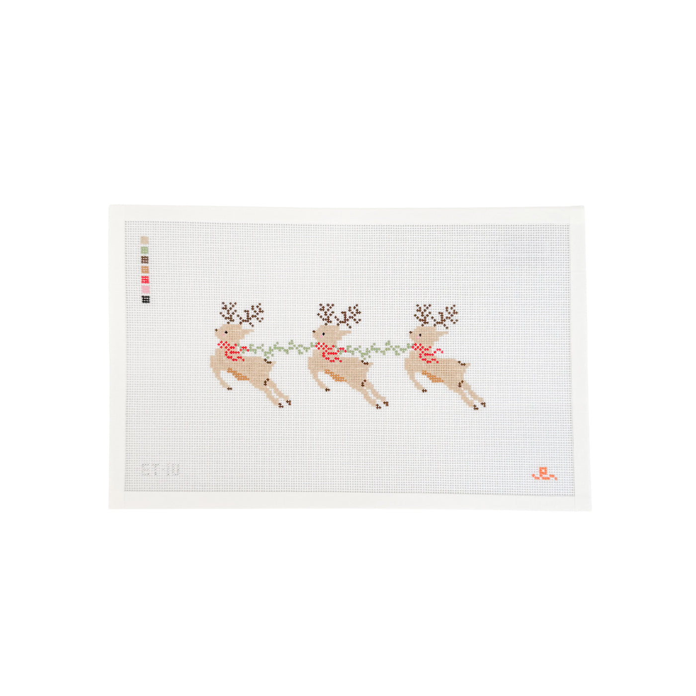 white rectangular needlepoint canvas with 3 reindeer connected by a green garland with red ribbons at their necks