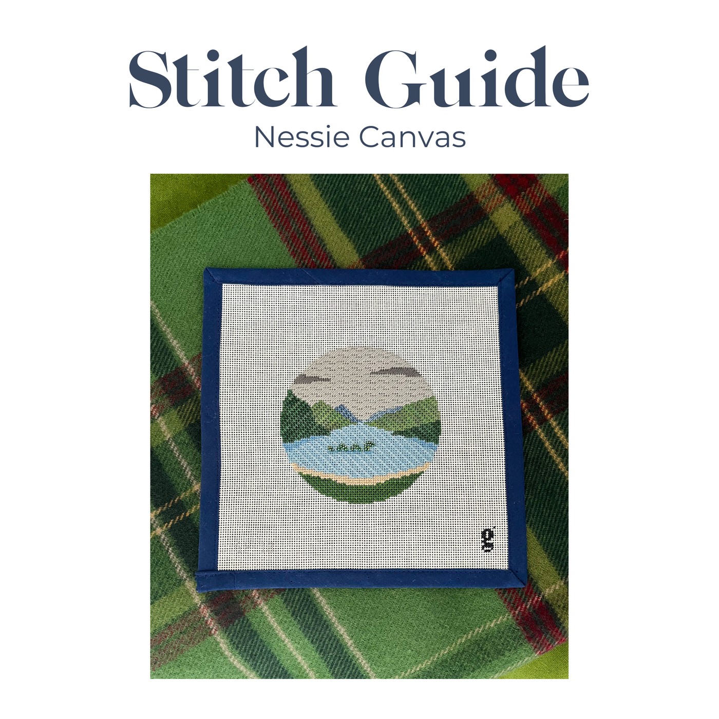 Photograph of stitched Loch Ness Monster canvas on green tartan blanket