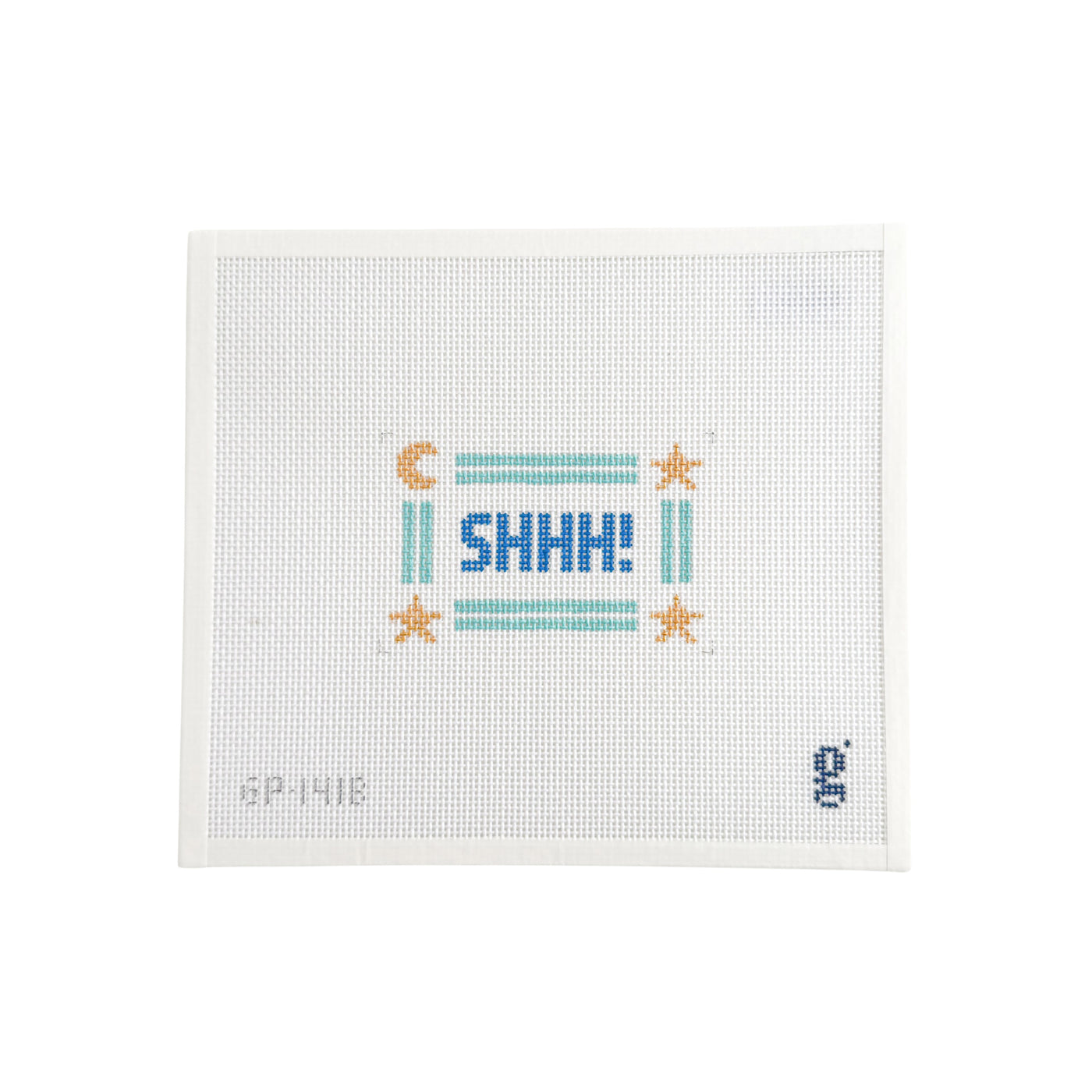 White rectangular needlepoint canvas with the word "SHHH!" at center in blue surrounded by aqua double striped border with a gold star in 3 corners and a gold crescent moon in the last corner