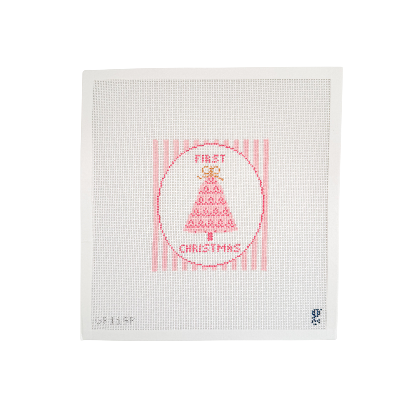 White needlepoint canvas with pink and white striped rectangular design featuring a white oval at center with a pink Christmas tree and the words "FIRST CHRISTMAS" at top and bottom respectively.