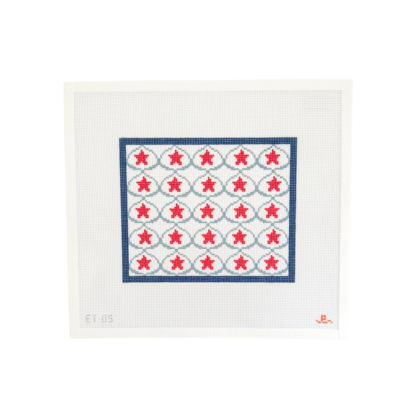 White needlepoint canvas with dark blue square design with red stars surrounded by light blue shell shape