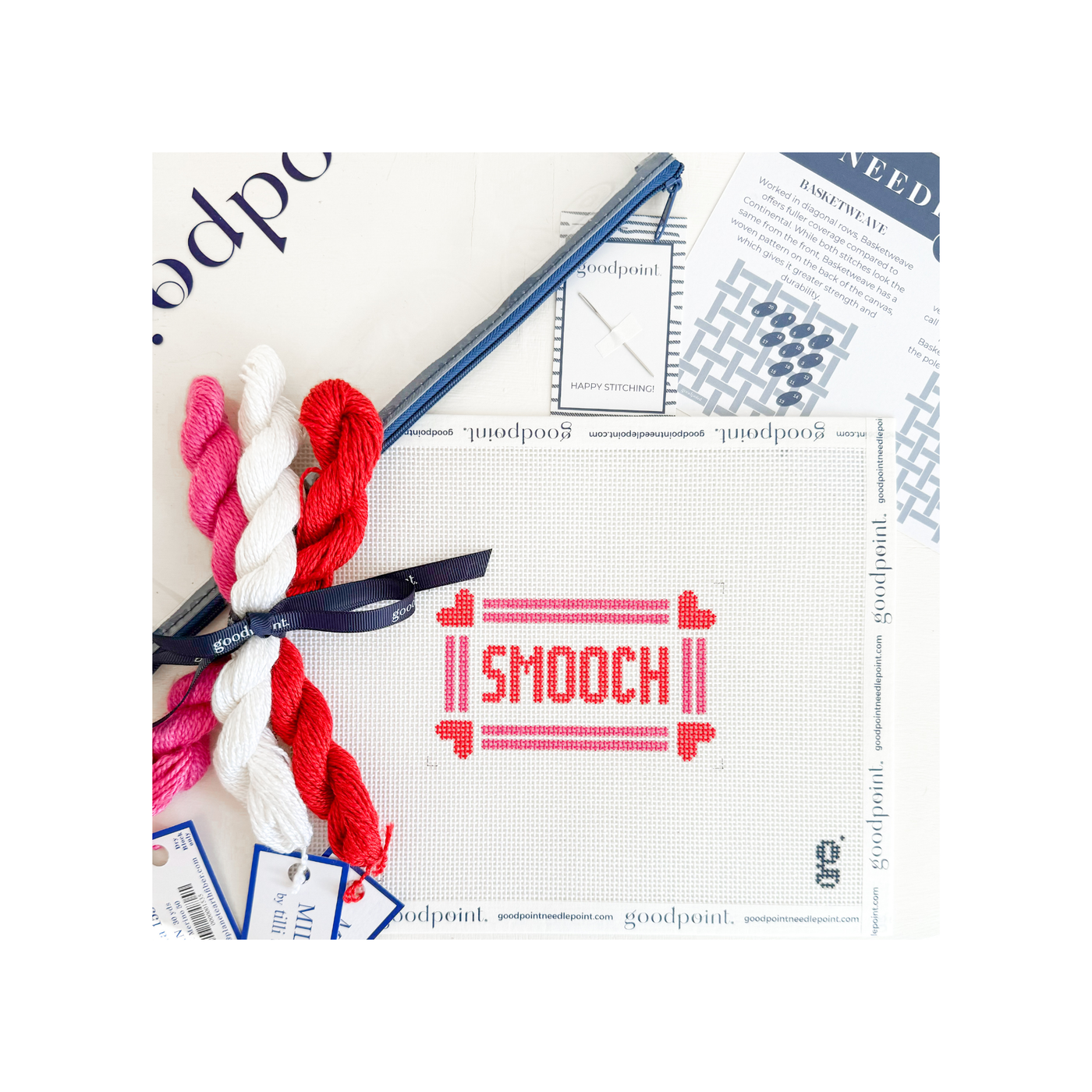 White and red "SMOOCH" needlepoint canvas with threads, clear project bag, and instruction postcard