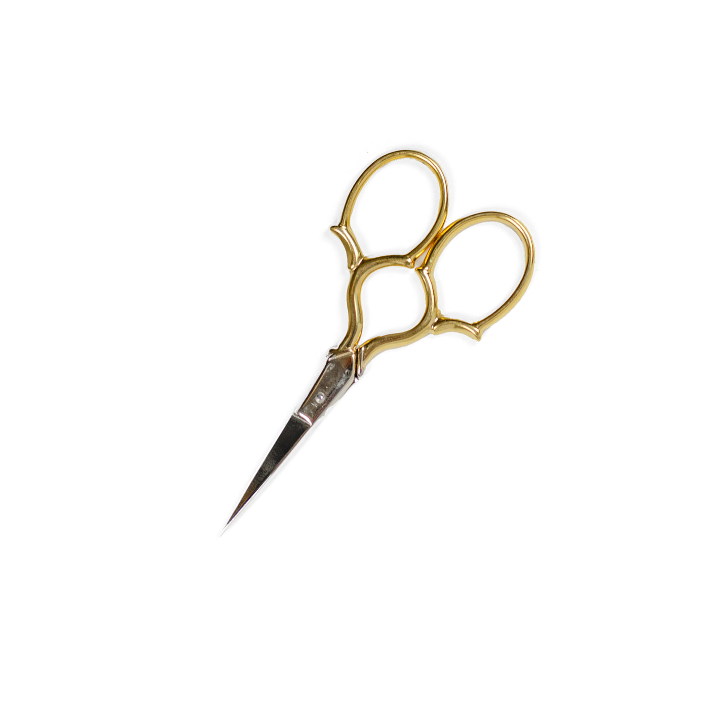 Gold handled embroidery scissors on a white background.