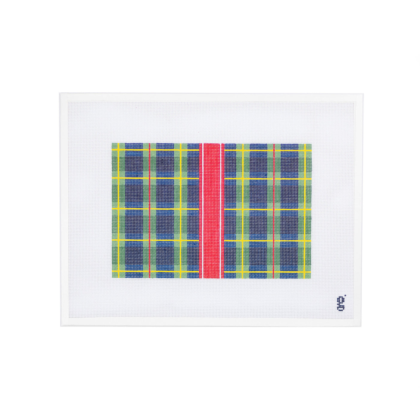 White rectangular needlepoint canvas featuring a blue, green, yellow & red tartan plaid. There is a red vertical stripe going down the middle of the design.