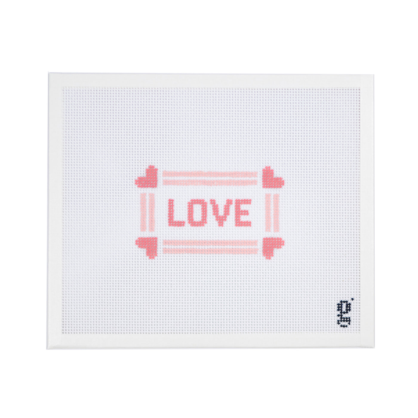 White needlepoint canvas with the word "LOVE" in pink block letters at center. The word is surrounded by a lighter pink double stripe with 4 darker pink hearts at each corner.
